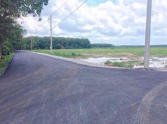 Cần Bán Đất 1000M Sổ Hồng Sắn Mặt Tiền Đang Lên Nhựa